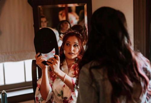 Bride looking in a mirror